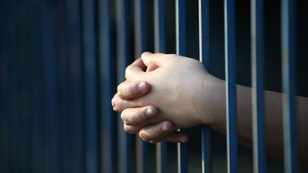 Prisoner hand in jail