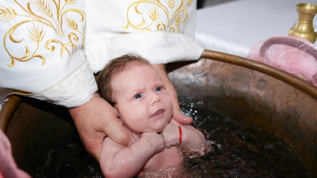 Newborn baby water baptism ritual