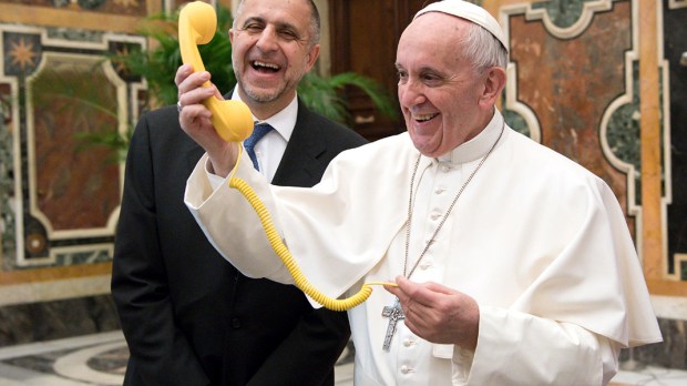web3-pope-francis-phone-smile-laugh-ho-osservatore-romano-afp