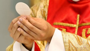 web3-priest-holy-communion-eucharist-wideonet-shutterstock