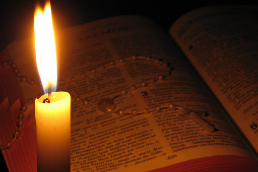 Bible and candle