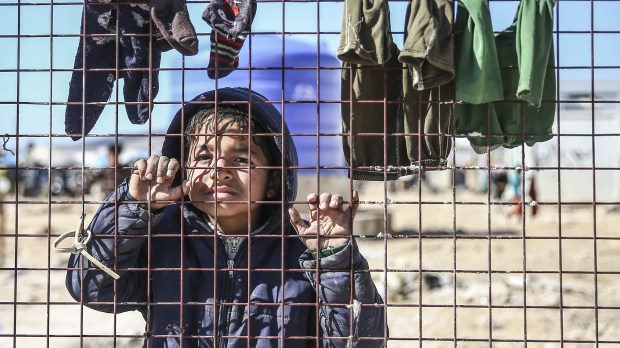 Syrians camp on Turkey-Syria border near Aleppo