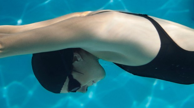 web3-swimming-woman-water-pool-patrik-giardino-getty-images