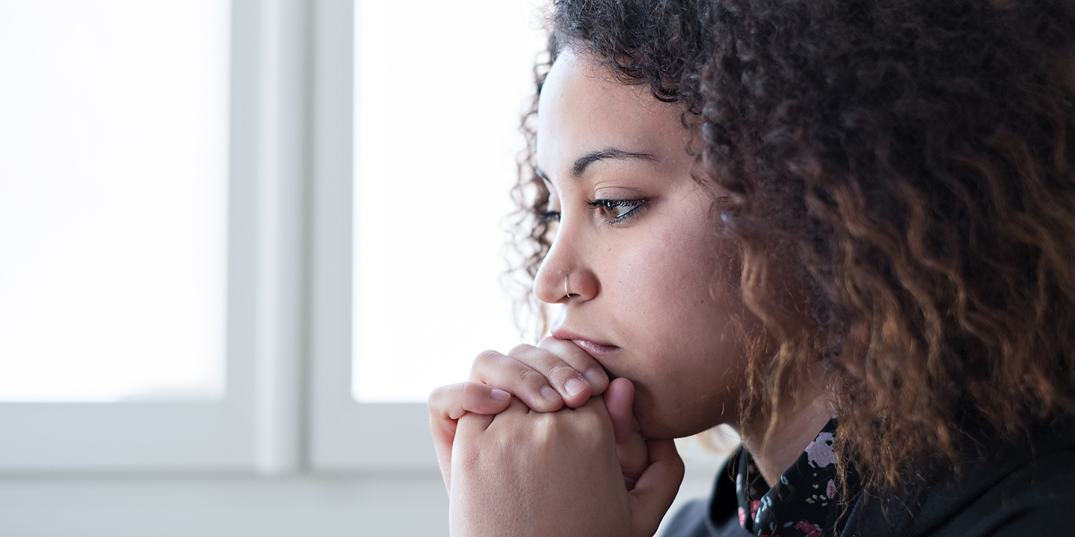 WEB3 AFRICAN AMERICAN WOMAN ANXIETY DEPRESSED SAD HOME Shutterstock
