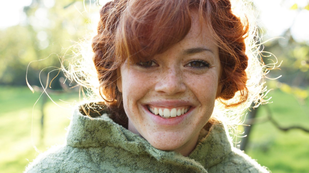 web3-woman-red-hair-freckles-knsy-knsy-getty-images