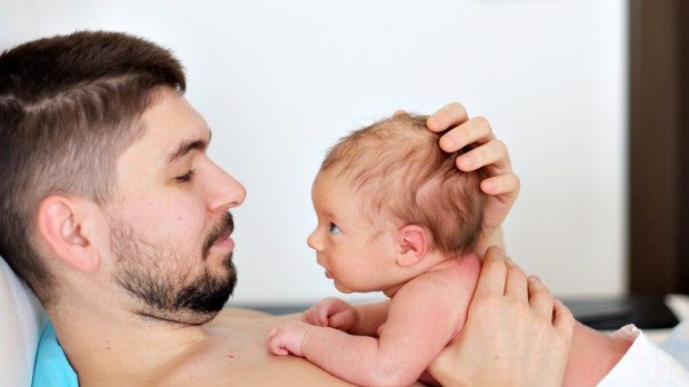WEB3 DAD CHILD BABY NEWBORN LOOKING RELATIONSHIP FATHER Shutterstock