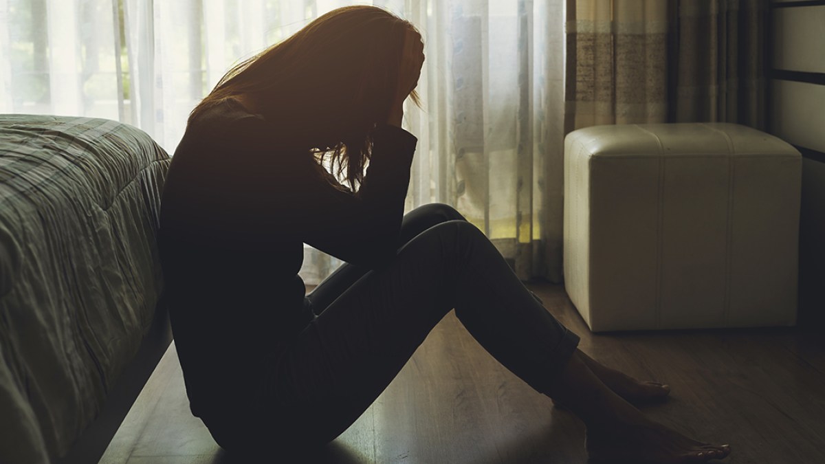 WEB3-SUFFERING-UPSET-CRYING-WOMAN-SILHOUETTE-SITTING-shutterstock_636183893-Shutterstock