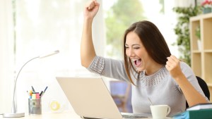 WOMAN BEHIND COMPUTER