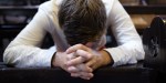 MAN,PRAYING,CHURCH