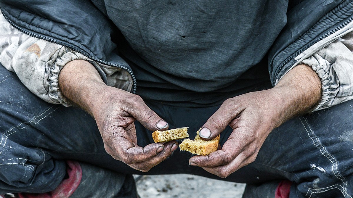 web3-homeless-man-bread-hands-shutterstock