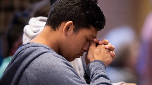 PRAYING,PRAYER,YOUNG MAN