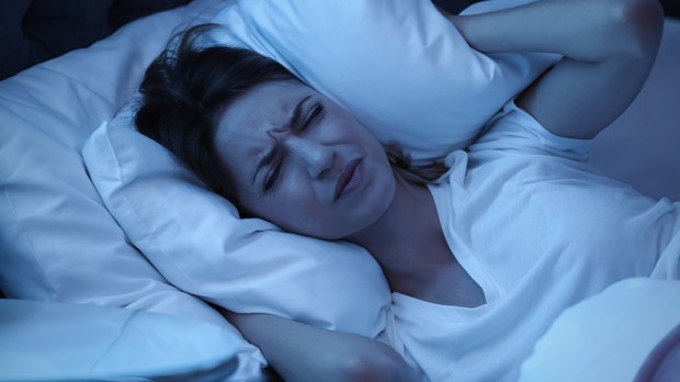 web3-woman-bad-sleep-bed-shutterstock.jpg