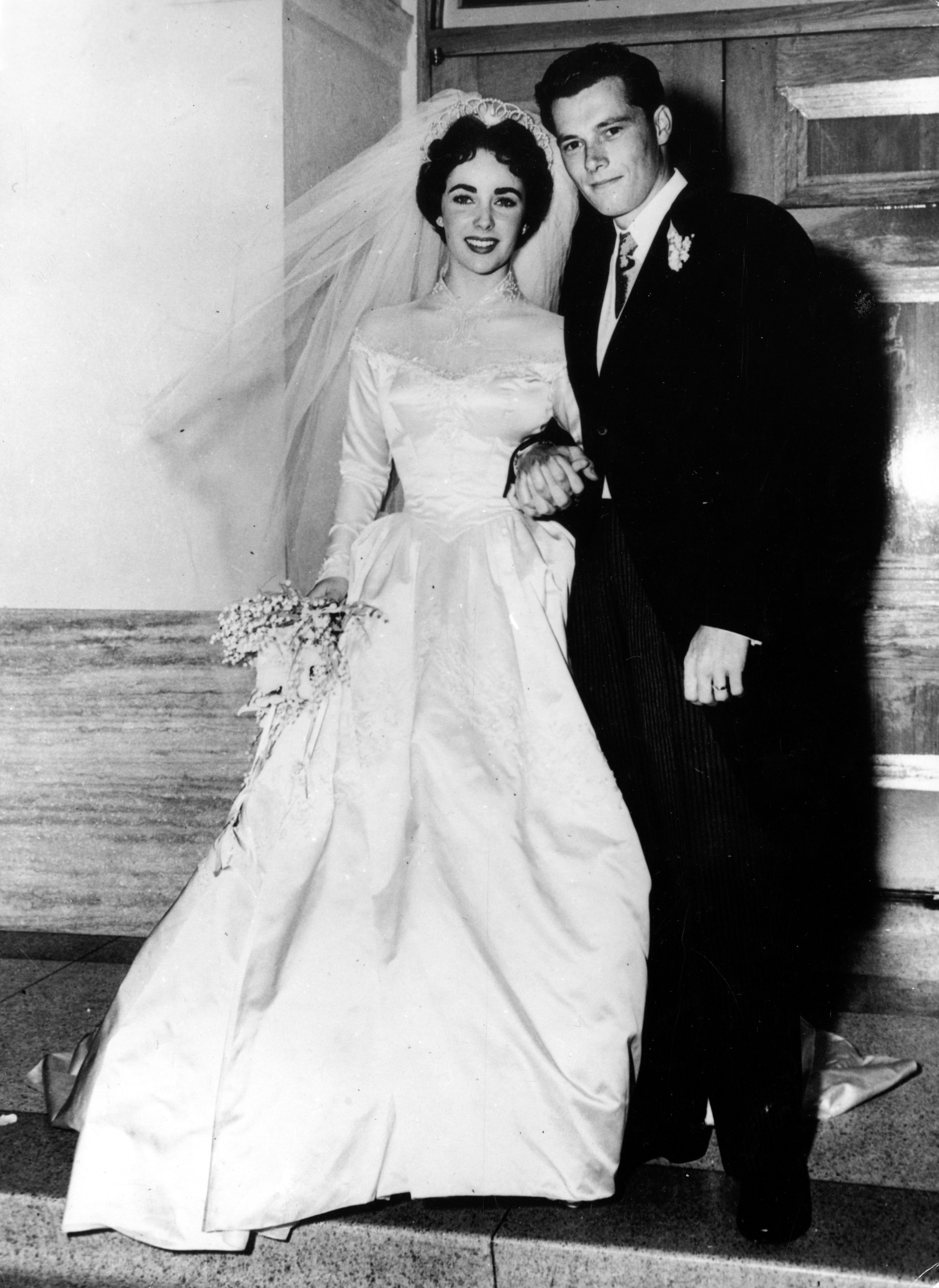 ELIZABETH TAYLOR AND CONRAD HILTON JR.