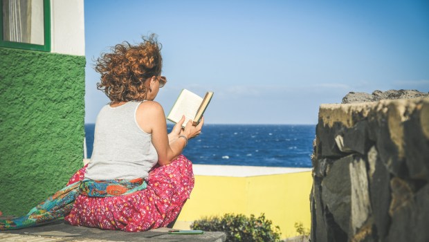 woman reading book