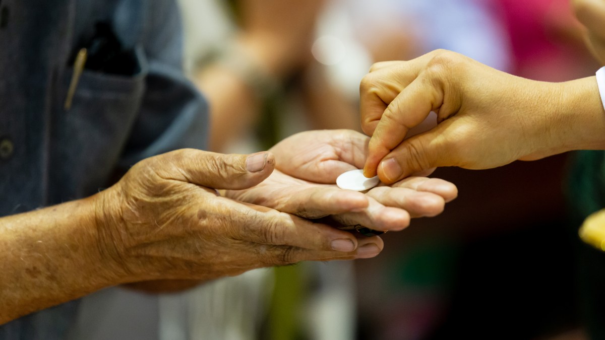 eucharist-hands-shutterstock_1091081897.jpg