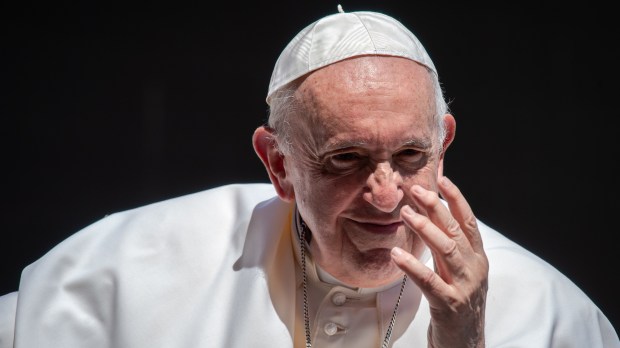 Pope Francis blesses faithful as he leaves St. Peter's square on the Popemobile