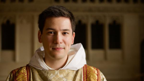 young priest in vestments