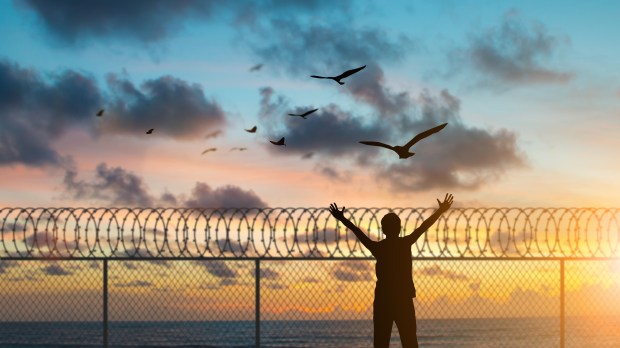 prison-prayer-freedom-shutterstock_495818326.jpg
