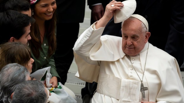 Pope Francis blesses faithful at the end of his weekly general audience in Paul VI Hall