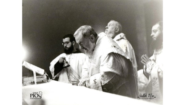 Black and white photo of Padre Pio celebrating Mass, taken by Elia Stelluto, published by the Saint Pio Foundation