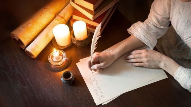 woman writting an old letter