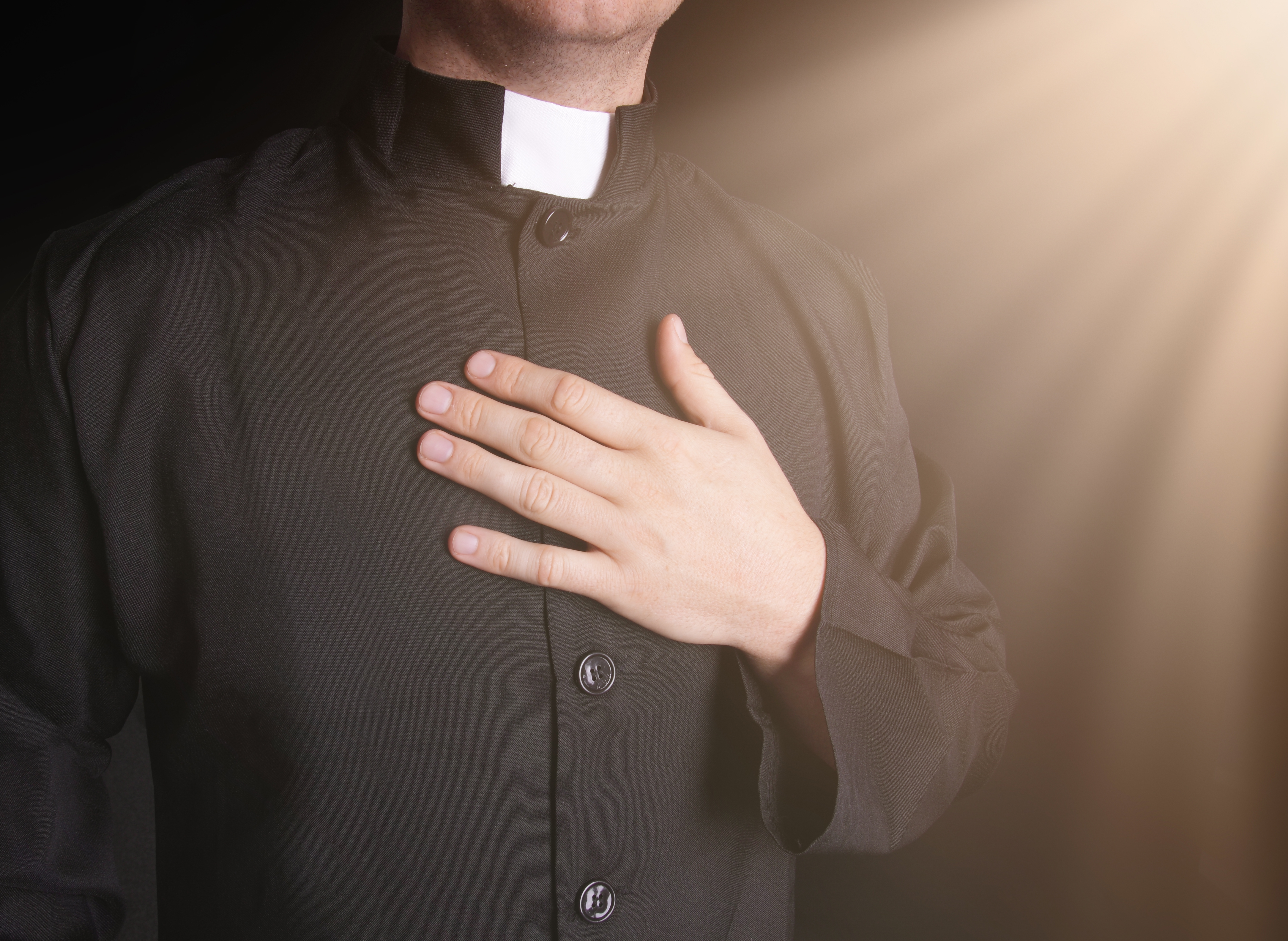 Praying,Priest