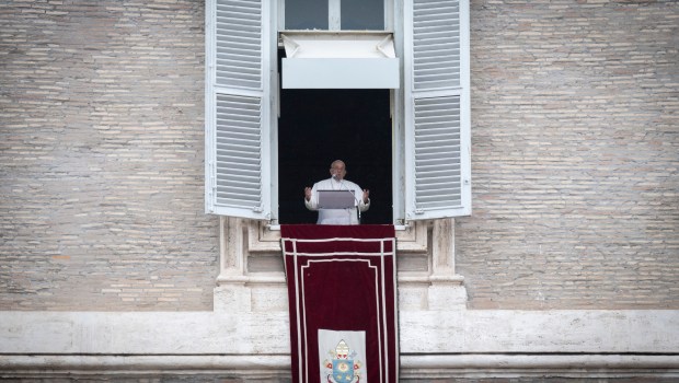Pope Francis addresses the crowd from the window of the apostolic palace overlooking St. Peter's square during the Regina Coeli prayer on May 19, 2024 in The Vatican.