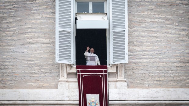 Pope Francis addresses the crowd from the window of the apostolic palace overlooking St. Peter's square during the Regina Coeli prayer on May 19, 2024 in The Vatican.