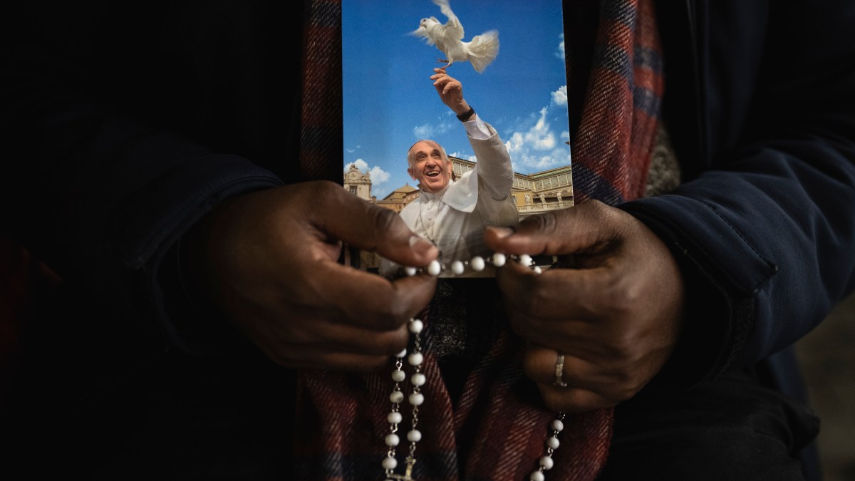 Priest pray the rosary in St. Peter's Square at The Vatican, Friday, Mar. 14, 2025