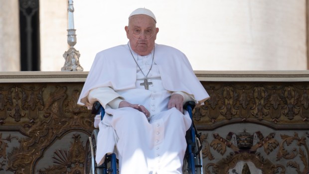 Pope Francis is pushed in a wheelchair on St. Peter's square to conduct the Angelus prayer in The Vatican, on April 6, 2025.