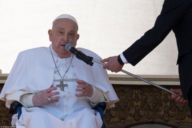 Pope Francis is pushed in a wheelchair on St. Peter's square to conduct the Angelus prayer in The Vatican, on April 6, 2025.