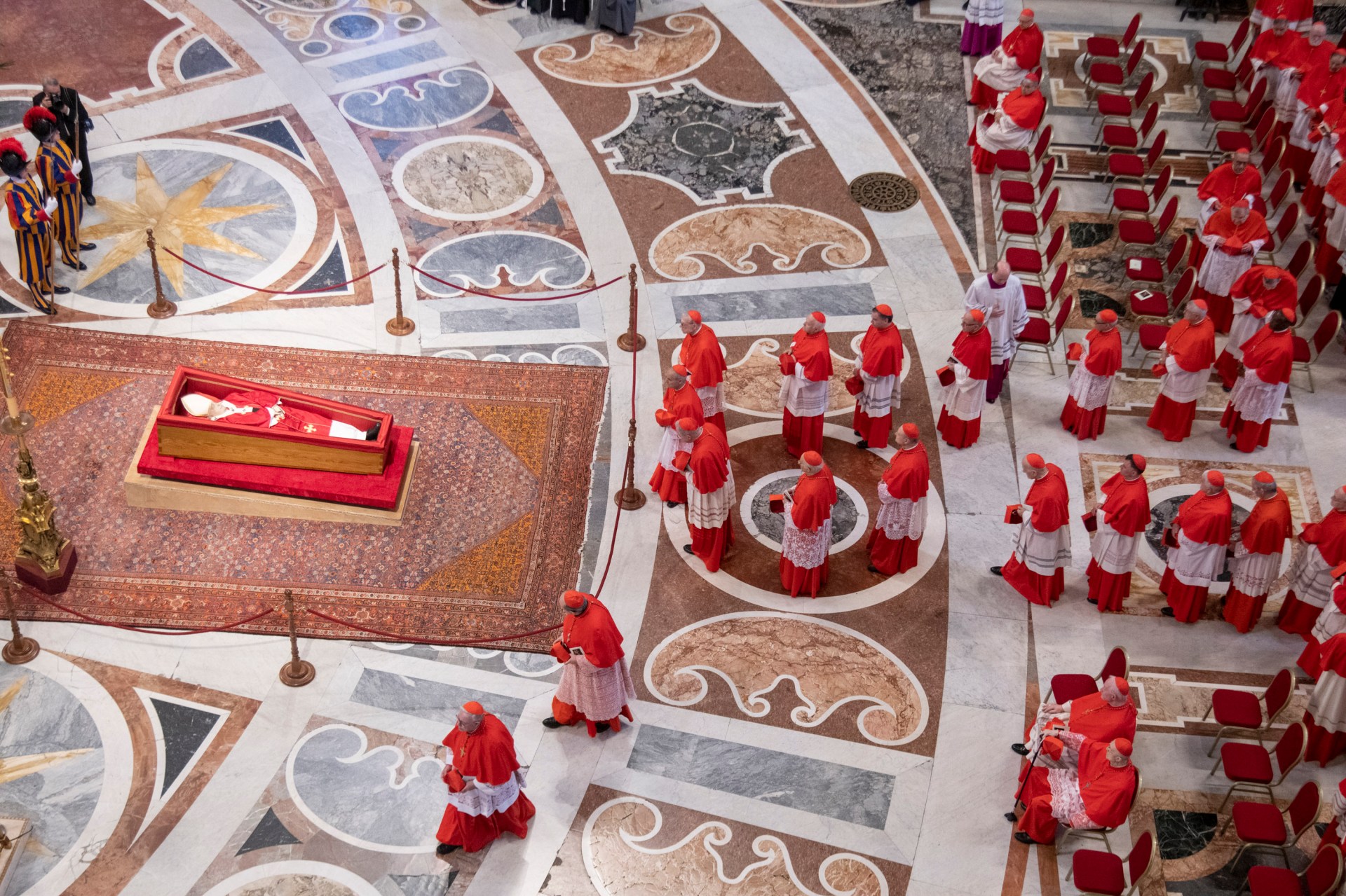 Pallbearers carry the coffin of the late Pope Francis inside St Peter's Basilica as it is transported in a procession from the chapel of Santa Marta to St Peter's Basilica, following the Pope's death, in the Vatican on April 23, 2025.