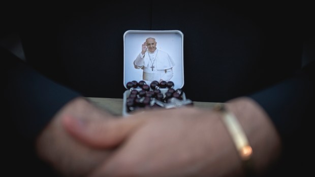 Faithful pray during the Rosary prayers in honor of Pope Francis