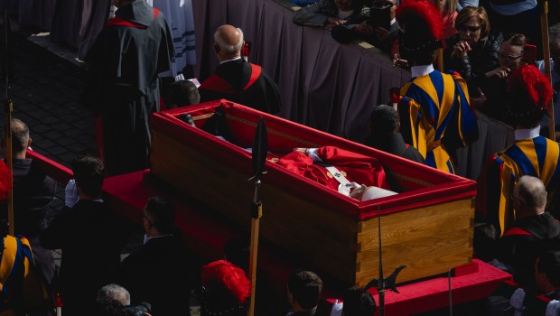 Pallbearers carry the coffin of the late Pope from the chapel of Santa Marta to St. Peter's Basilica in the Vatican on April 23, 2025.