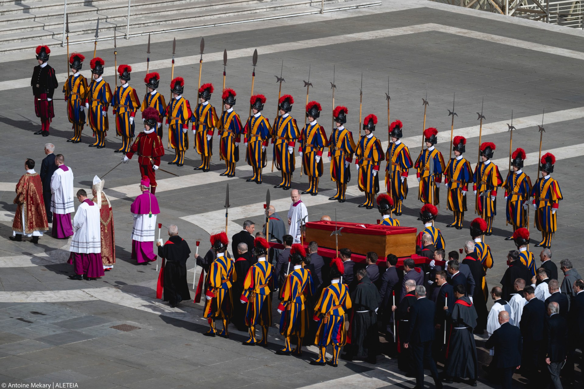 Pallbearers carry the coffin of the late Pope from the chapel of Santa Marta to St. Peter's Basilica in the Vatican on April 23, 2025.