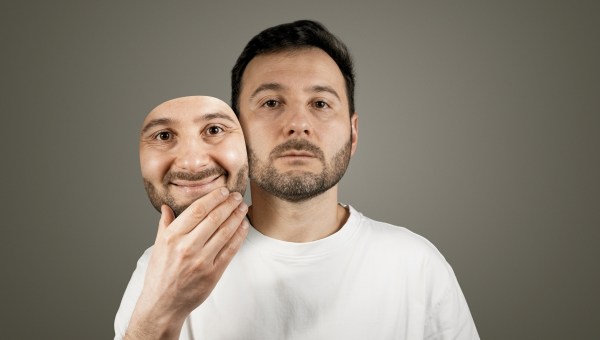 The man hides his true emotions