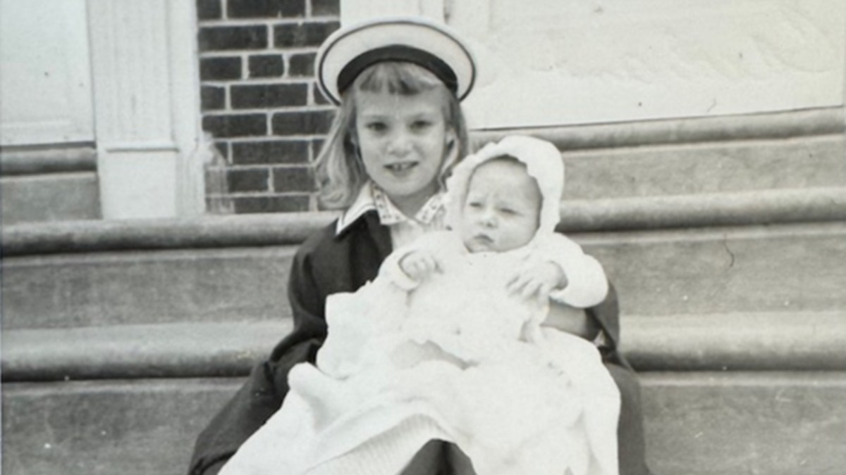 Carol Ann Dougherty holding her sister, Kay
