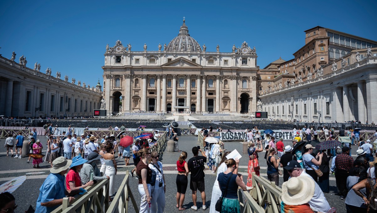 Faithful gather under the summer heat in St. Peter’s Square to participate in the Angelus prayer led by Pope Leo XIV at the Vatican, June 21, 2026.