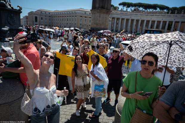 Faithful gather under the summer heat in St. Peter’s Square to participate in the Angelus prayer led by Pope Leo XIV at the Vatican, June 21, 2026.